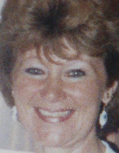 Figure 14. The patient brought in this photo of her natural teeth to assist with positioning of the artificial teeth