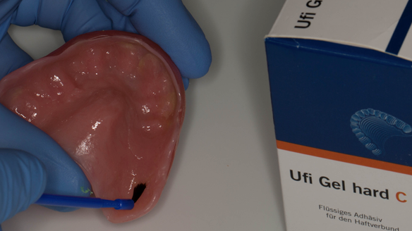 Figure 42 Adhesive applied to the fitting surface